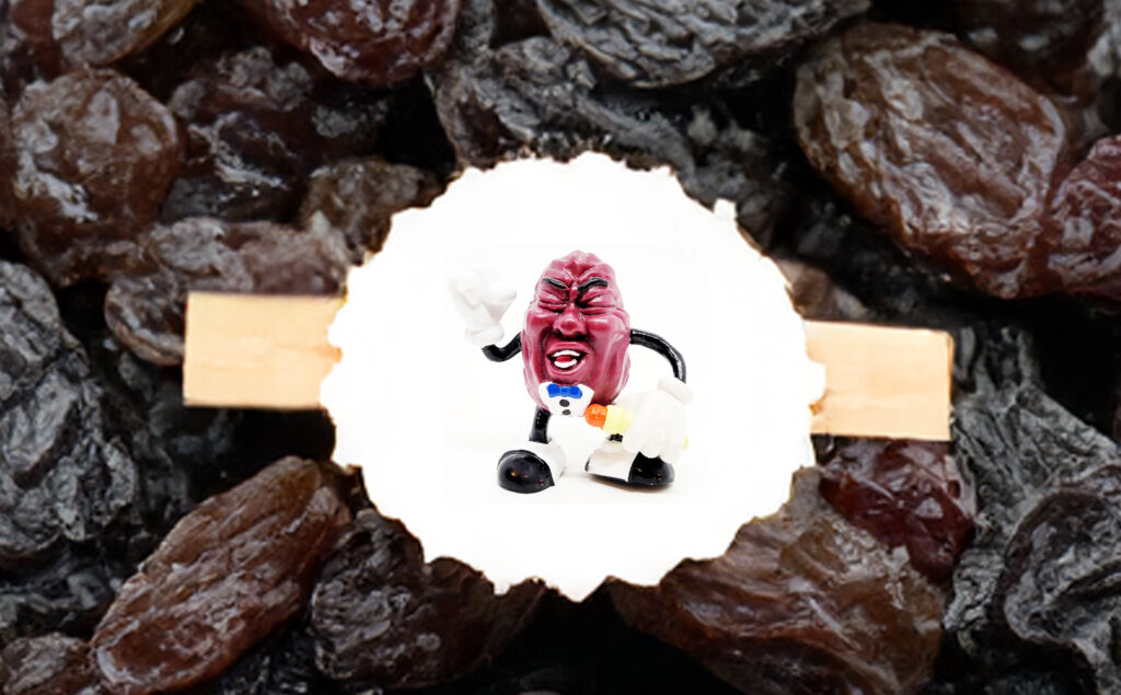 California Raisins collectible figure, posed singing